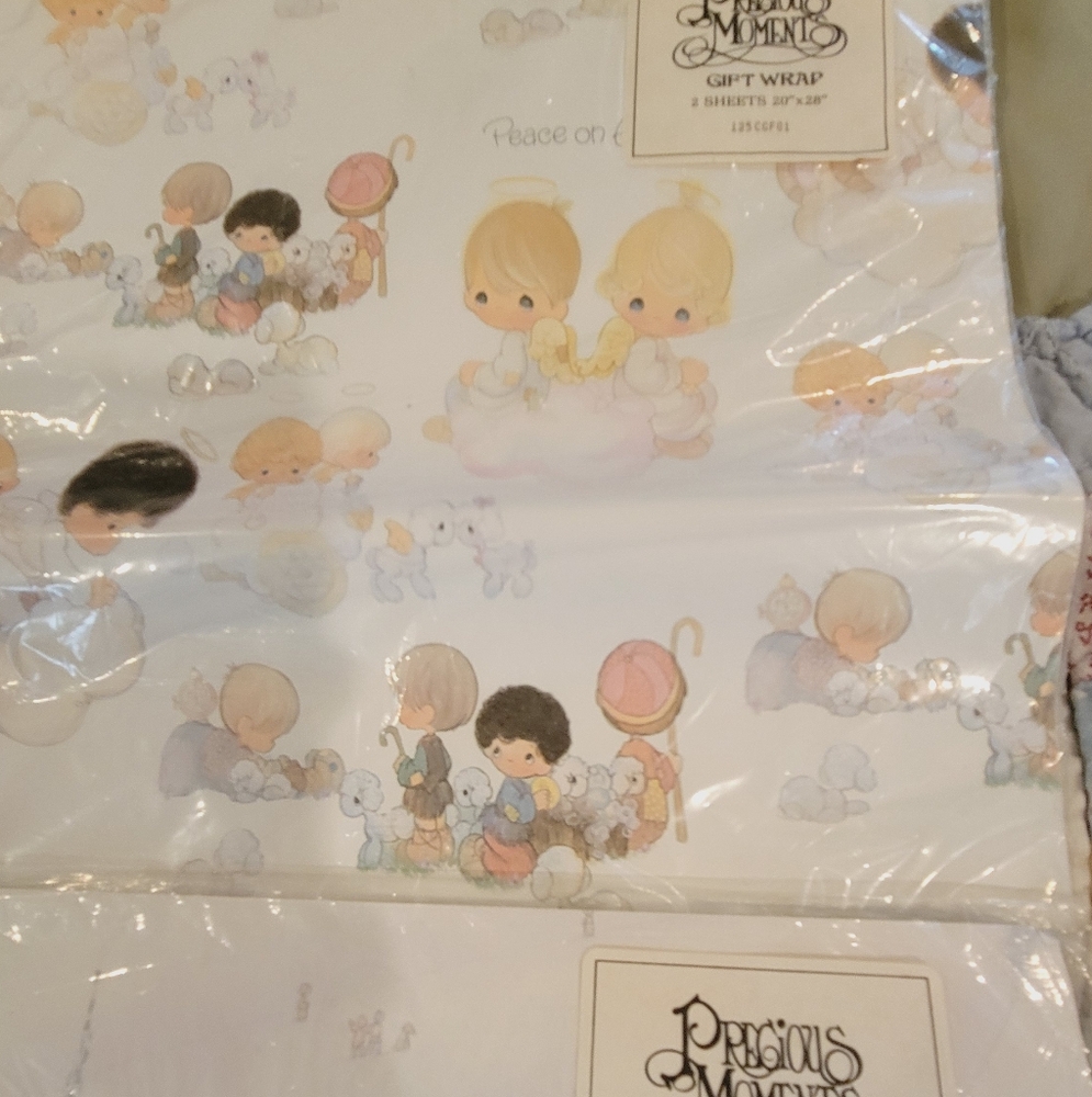 3 unopened sheets of vintage  Christmas wrapping 2 precious moments one religous